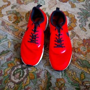 Red and black Nike sneakers